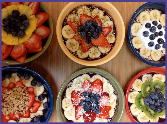 6 bowls with acai berries and other fruit
